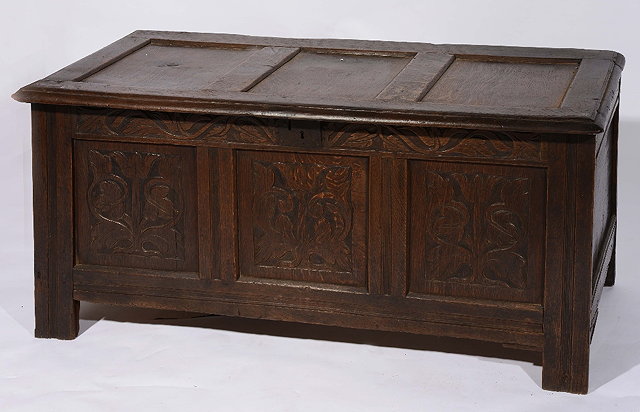 Appraisal: An th Century oak cofferwith carved panel front cm