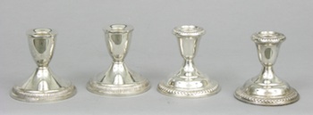 Appraisal: Two Pairs of Weighted Sterling Silver Candle Holders Two pairs