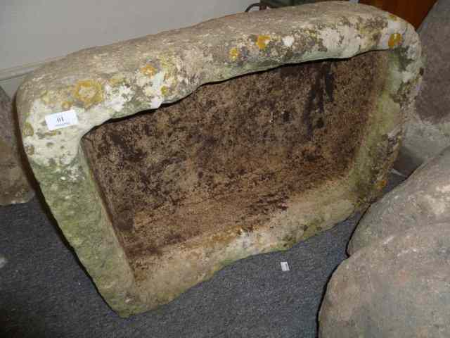 Appraisal: A COTSWOLD RECTANGULAR STONE TROUGH x approx