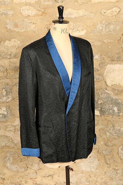 Appraisal: A s BLACK SATIN 'HARRODS' SMOKING JACKET with blue satin