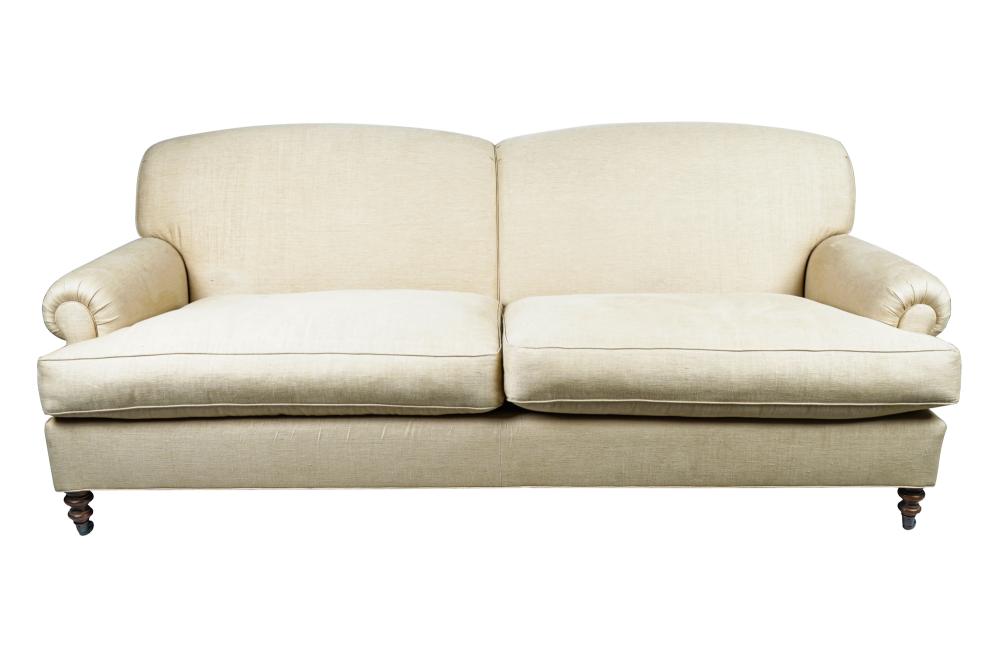 Appraisal: MICHAEL SMITH BEIGE UPHOLSTERED SOFAProvenance A Michael Smith installation inches