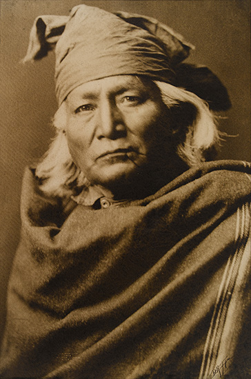 Appraisal: CURTIS EDWARD S - Portrait of an Apache Sepia-toned silver