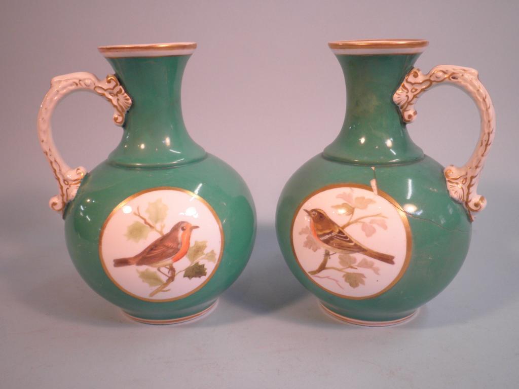 Appraisal: A pair of mid thC Staffordshire porcelain jugs each with