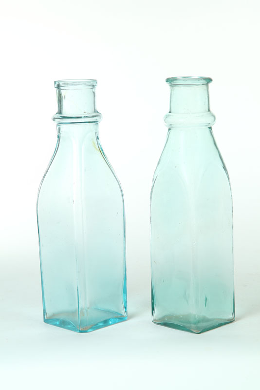 Appraisal: TWO BLOWN MOLDED PICKLE BOTTLES American mid th century possibly