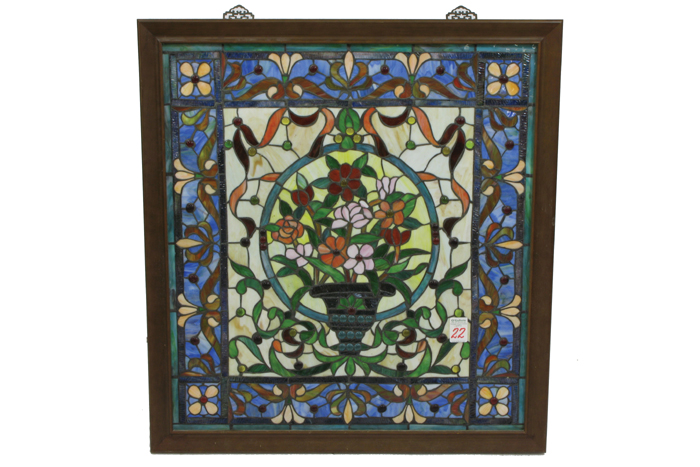 Appraisal: AN AMERICAN STAINED AND LEADED GLASS WINDOW centered with vase