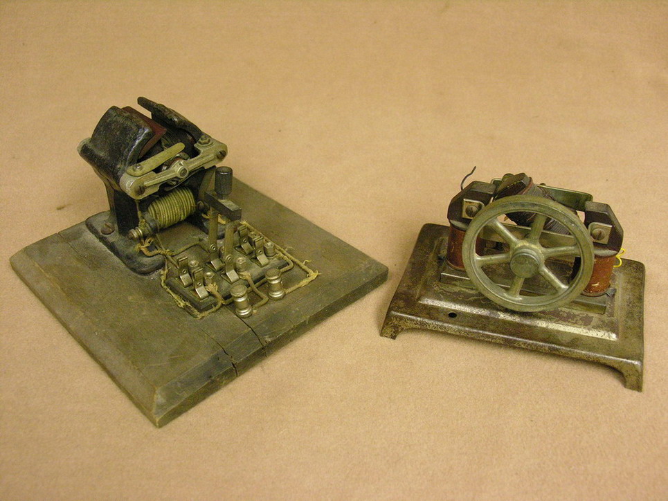 Appraisal: TWO VINTAGE MODEL ELECTRIC MOTORS metal base one is marked