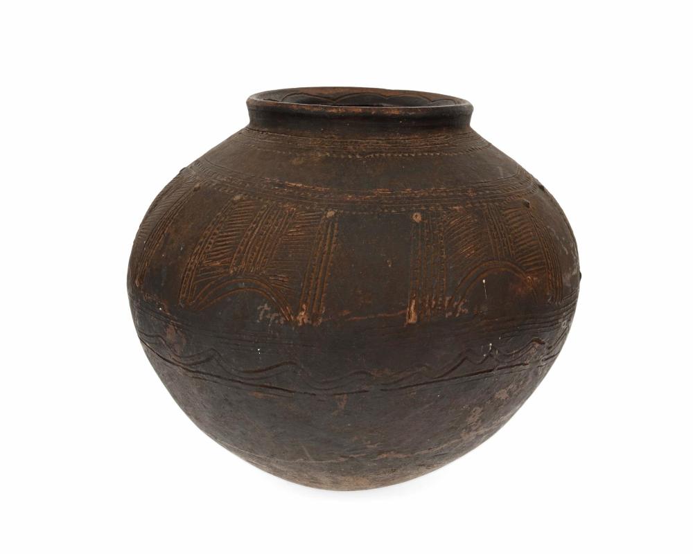 Appraisal: A NIGERIAN IGALA POTTERY WATER JARA Nigerian Igala pottery water