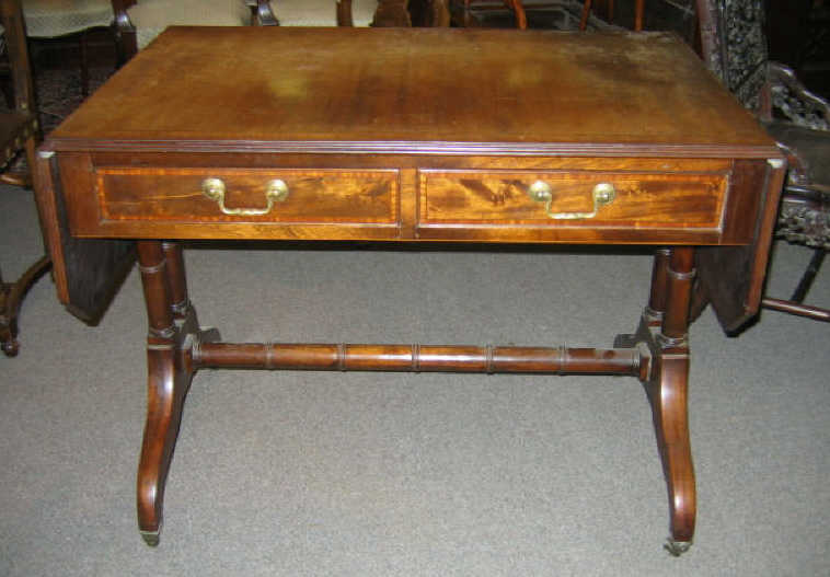 Appraisal: ENGLISH TH CENTURY MAHOGANY WRITING TABLE Having a rectangular crossbanded