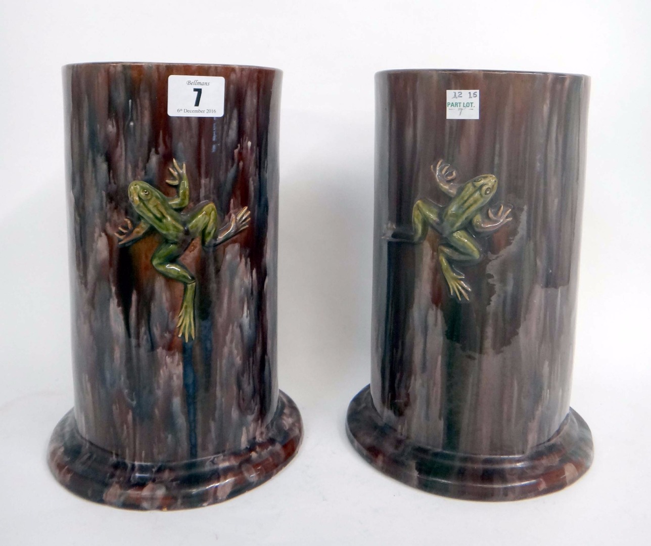 Appraisal: A pair of cylindrical pottery vases late th century with