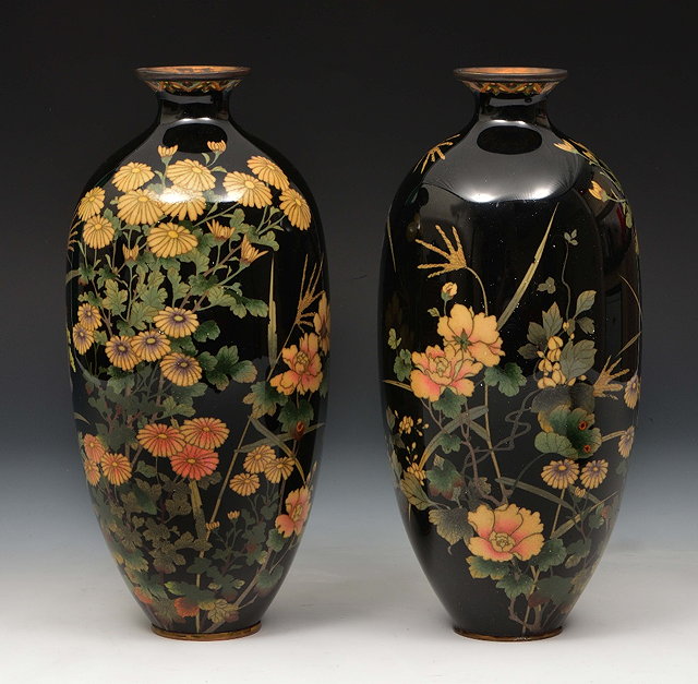 Appraisal: A pair of Japanese cloisonne vasesMeiji perioddecorated with flowers and