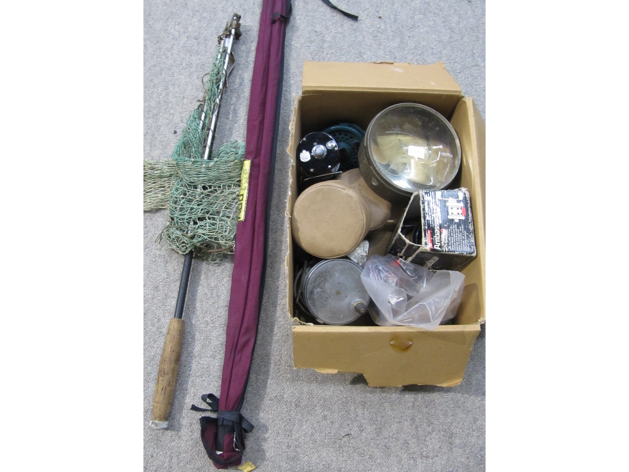 Appraisal: A lot comprising six fishing rods two nets and a