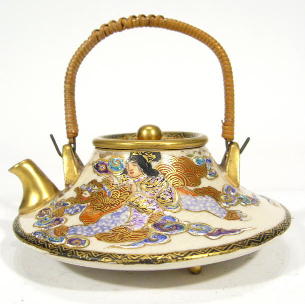 Appraisal: Miniature Japanese Satsuma pottery teapot of flattened form painted and