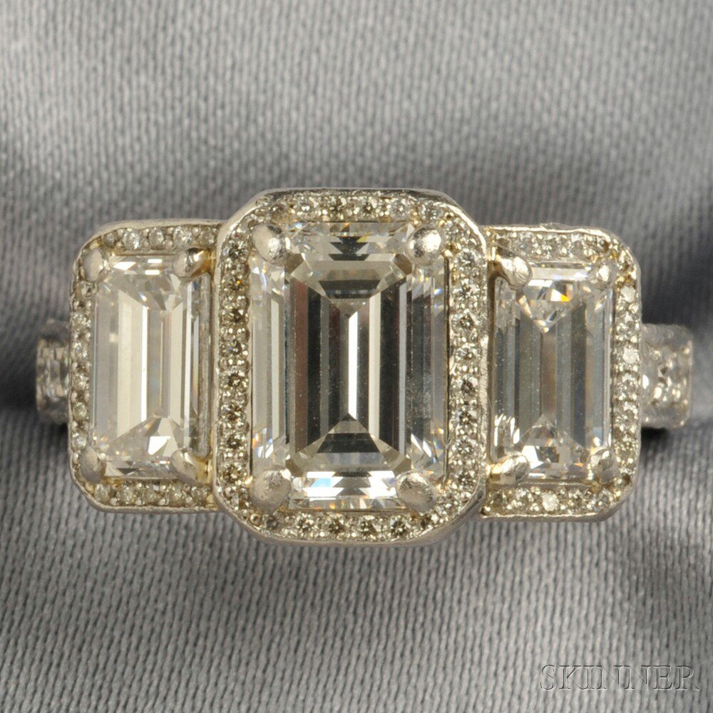 Appraisal: Platinum and Diamond Three-stone Ring set with three emerald-cut diamonds