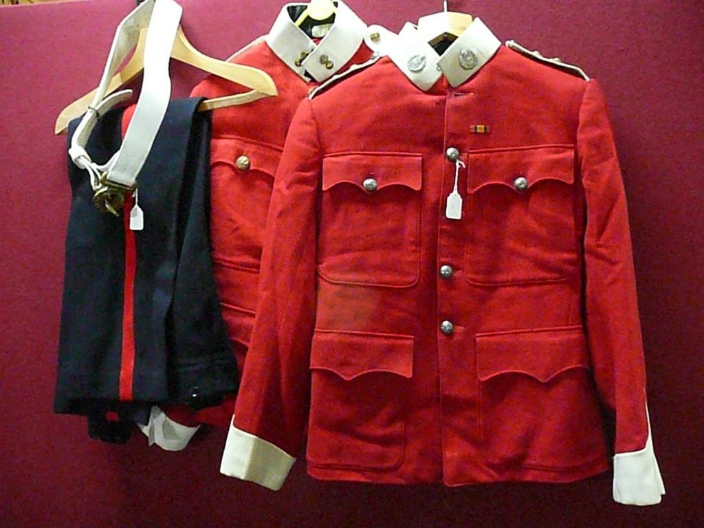 Appraisal: Two Victorian officers red dress jackets complete with lapel badges