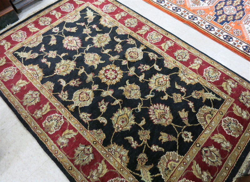 Appraisal: HAND KNOTTED ORIENTAL AREA RUG Indo-Persian floral Isfahan design on