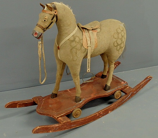 Appraisal: German Victorian stuffed dapple rocking horse with original red base