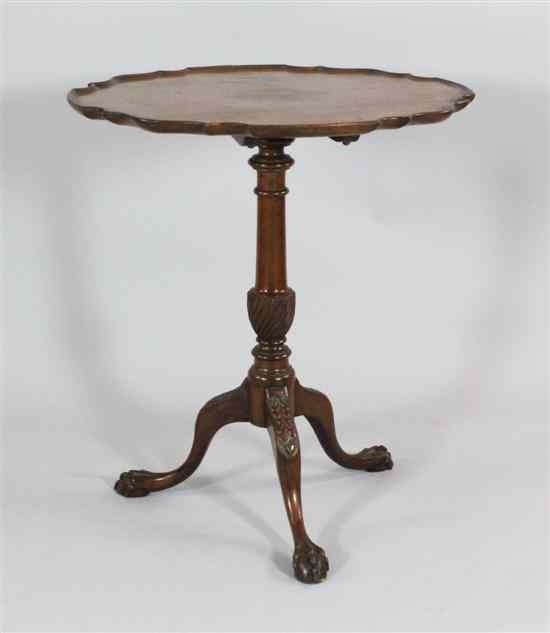 Appraisal: A George III design mahogany tilt top occasional table on