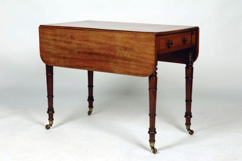 Appraisal: A LATE REGENCY MAHOGANY PEMBROKE TABLE the rectangular top with