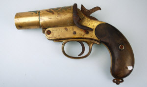 Appraisal: Brass flare pistol by Webley Scott with wood grips No