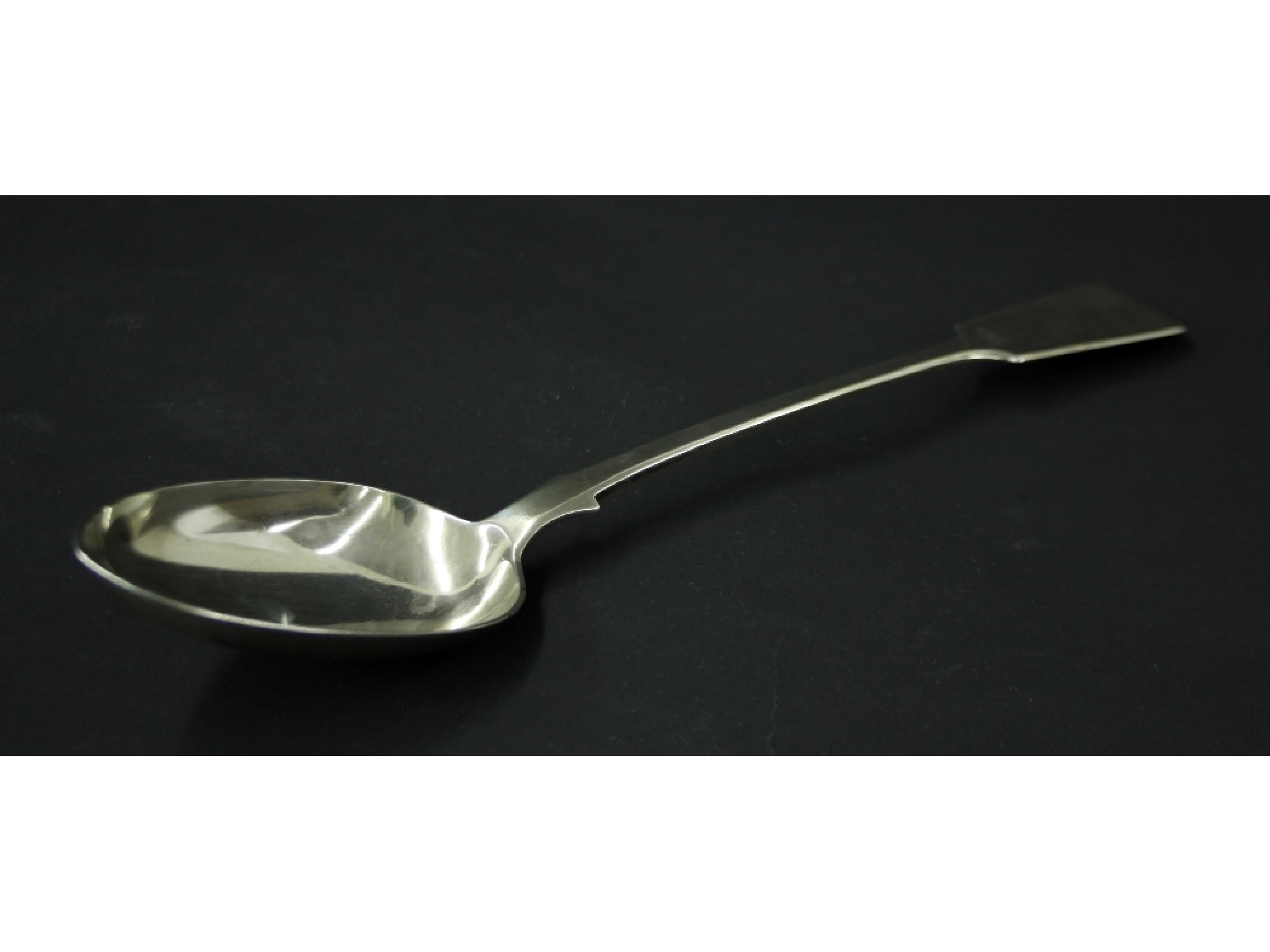 Appraisal: Victorian silver fiddle pattern serving spoon maker James Josiah Williams