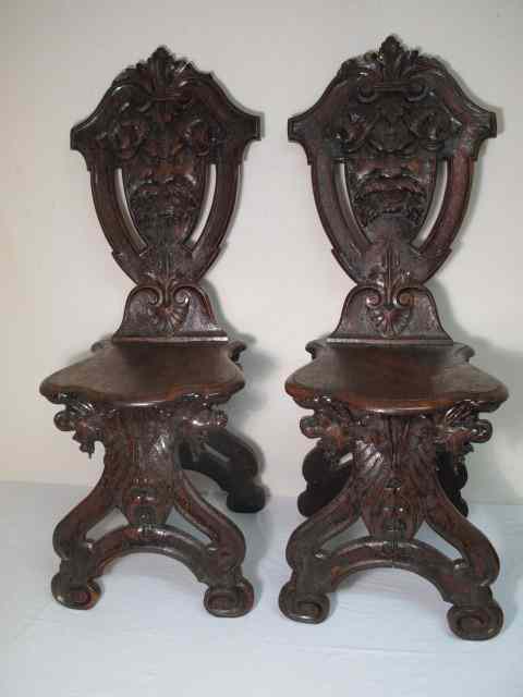 Appraisal: Pair of late th early th century carved Northwind chairs