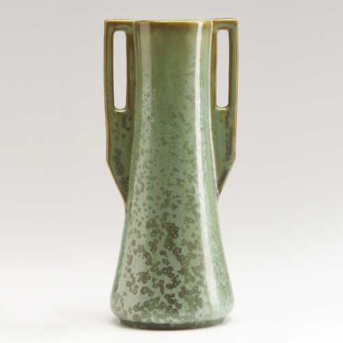 Appraisal: FULPER Vasekraft tapering vase with long cut-out buttressed handles covered