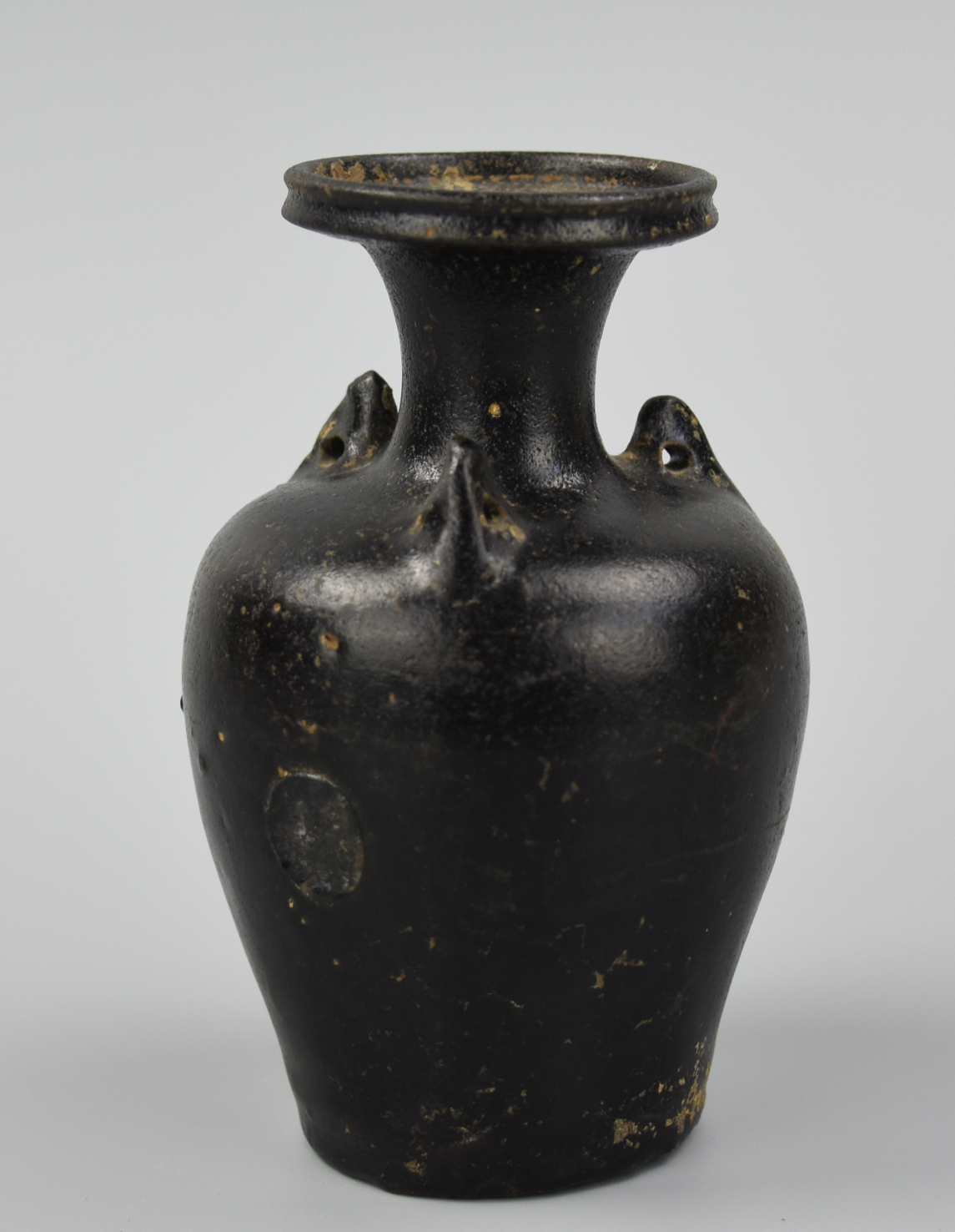 Appraisal: SMALL CHINESE BLACK VASE W HANDLES TANG DYNASTY A Tang