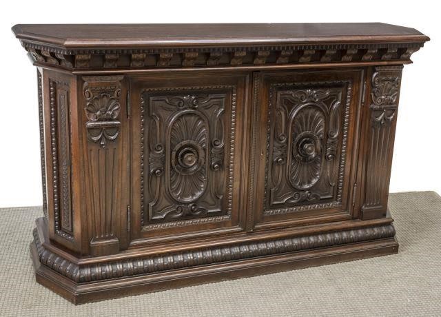 Appraisal: Italian carved walnut sideboard early th c a canted top