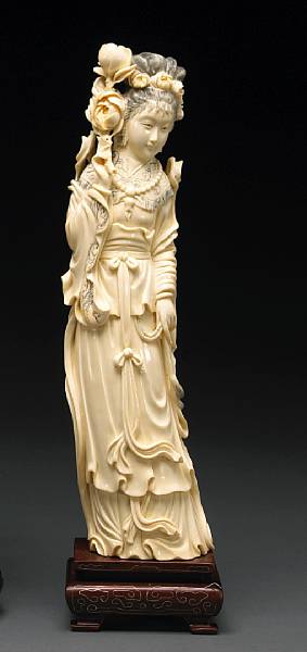 Appraisal: A tinted ivory beauty th Century The surfaces deeply undercut