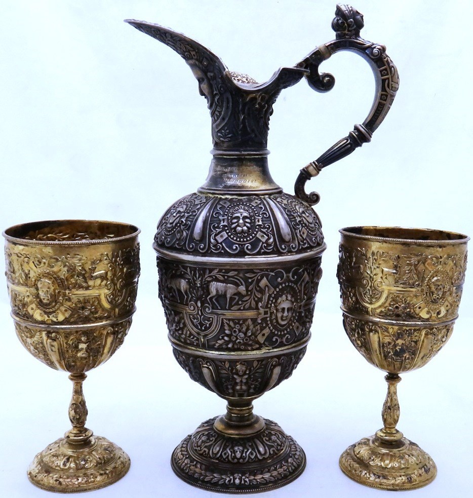 Appraisal: A Victorian silver and formerly gilt Cellini pattern claret jug