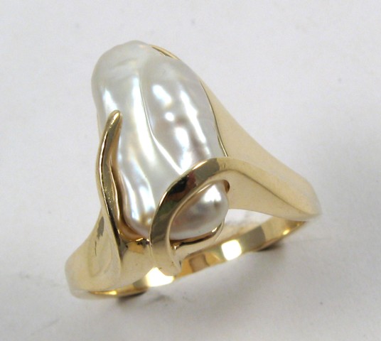 Appraisal: BAROQUE PEARL AND YELLOW GOLD RING The k yellow gold