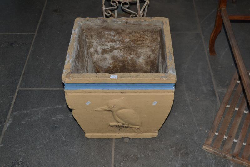 Appraisal: AN AUSTRALIANA YELLOW PAINTED CONCRETE PLANTER WITH KOOKABURRA MOTIF AN