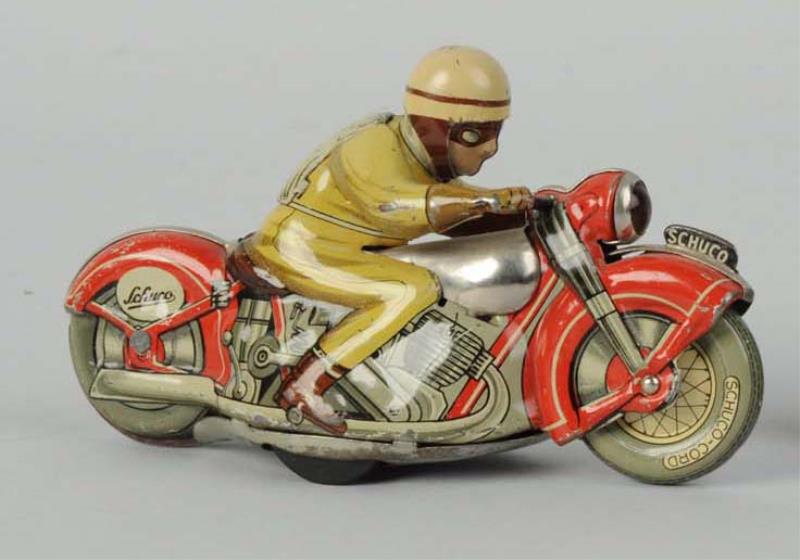 Appraisal: German Tin Litho Wind-Up Schuco Red Motorcycle Marked Moto-drill and