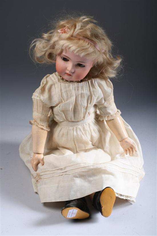 Appraisal: GERMAN PORCELAIN DOLL Marked AW W Germany Pierced ears sleep