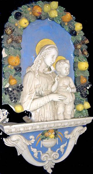 Appraisal: A Della Robia style plaque of Madonna and Child Depicted