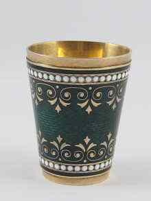 Appraisal: A green guilloche enamelled silver gilt vodka tot with white