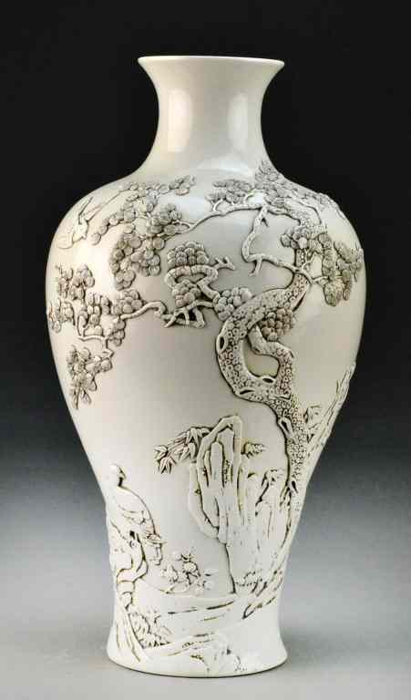 Appraisal: Chinese Qing Blanc de Chine Porcelain VaseFinely molded in high