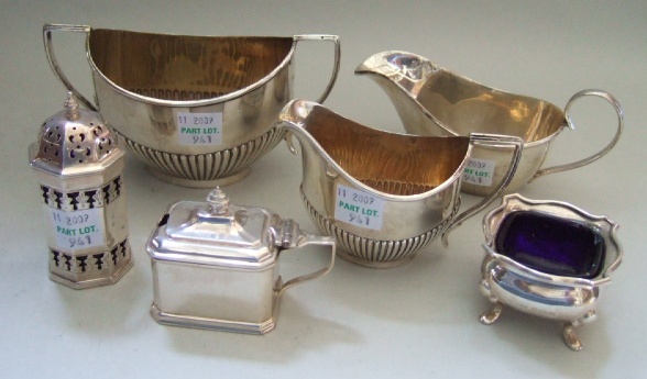 Appraisal: Silver comprising a twin handled sugar bowl and a matching