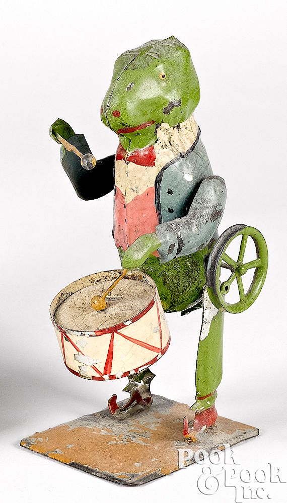 Appraisal: Drumming frog steam toy accessory Unusual painted tin drumming frog