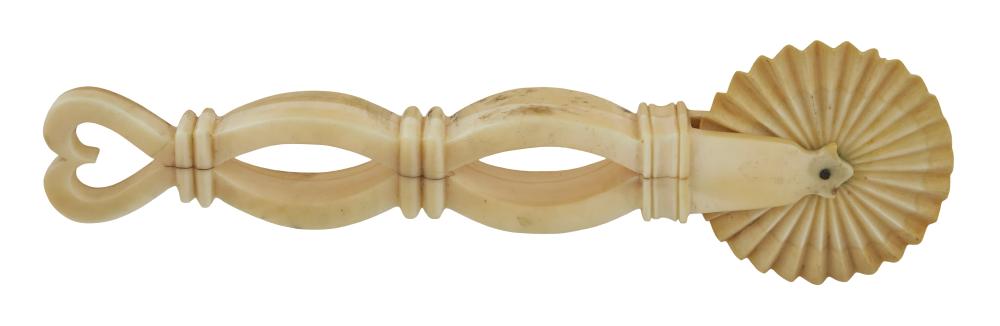 Appraisal: WHALE IVORY PIE CRIMPER WITH OPENWORK HANDLE MID- TH CENTURY