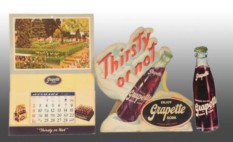 Appraisal: Lot of Assorted Grapette Items Description s Includes calendar and