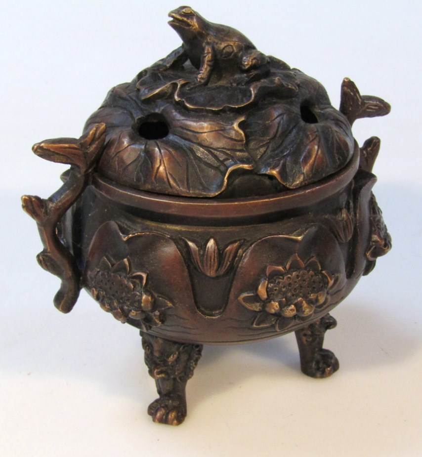 Appraisal: A bronzed Chinese Ming style censer and cover the domed