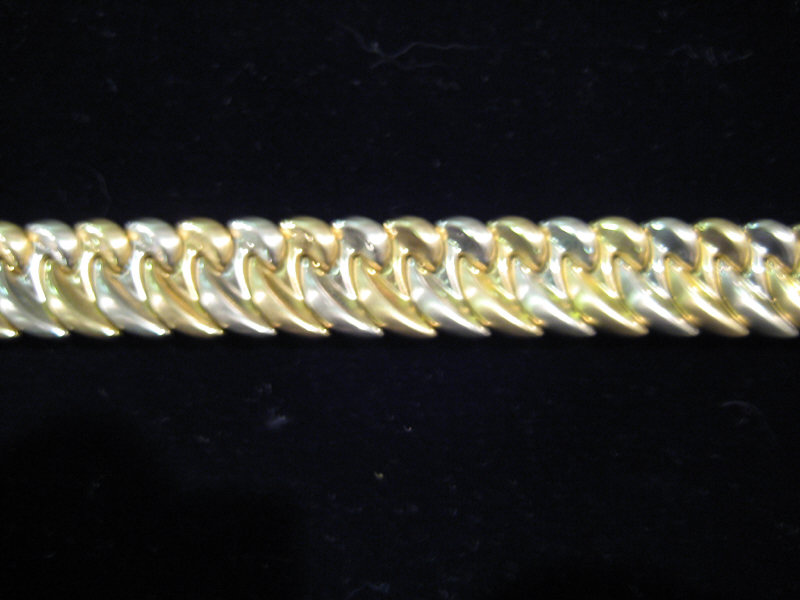 Appraisal: GOLD BRACELET k two tone gold polish satin wave link