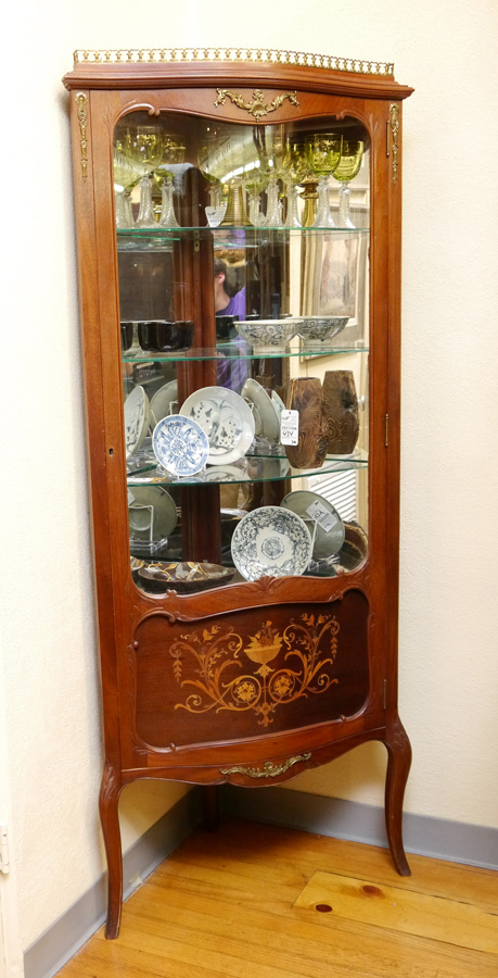 Appraisal: ORMOLU MAHOGANY INLAID FRENCH CORNER CURIO CABINET Serpentine front with