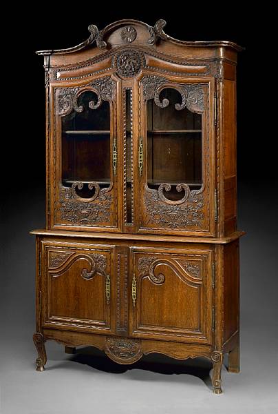 Appraisal: A Louis XV style carved oak buffet a deux corps