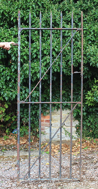 Appraisal: A BLACK PAINTED WROUGHT IRON GARDEN GATE with spiked top