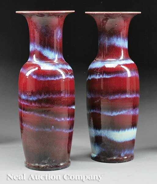 Appraisal: A Pair of Chinese Flamb Glazed Baluster Vases covered allover