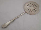 Appraisal: An unmarked white metal tests silver pastry server wt g