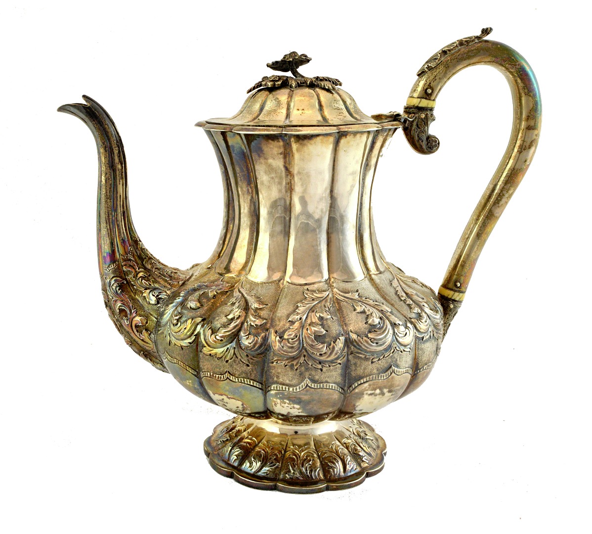 Appraisal: A William IV silver coffee pot of melon fluted form