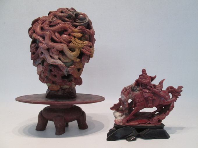 Appraisal: TWO CHINESE CARVED SOAPSTONE SCULPTURES entwined dragon boulder raised on